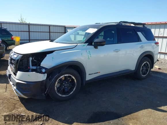 2023 Nissan Pathfinder Rock Creek with VIN 5N1DR3BD2PC270554, listed as a IAAI auction lot 42200457 with 18,249 mi miles and . Bid and sale history available at DreamBid. Image 2.