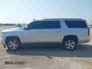 2015 Chevrolet Suburban LT with VIN 1GNSCJKC9FR271308, listed as a IAAI auction lot 42896617 with 202,547 mi miles and . Bid and sale history available at DreamBid. Image 14.