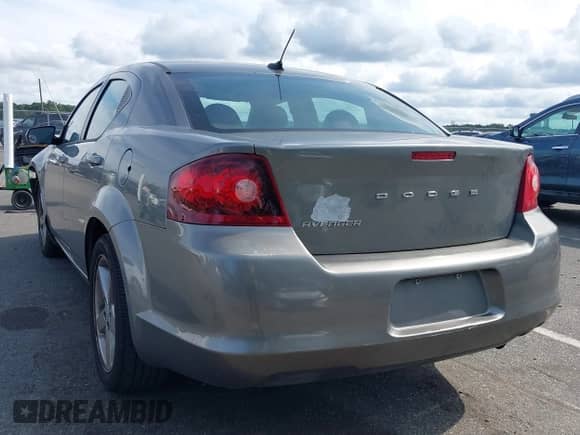 2013 Dodge Avenger SE with VIN 1C3CDZAB0DN535896, listed as a IAAI auction lot 43187549 with 132,614 mi miles and . Bid and sale history available at DreamBid. Image 3.