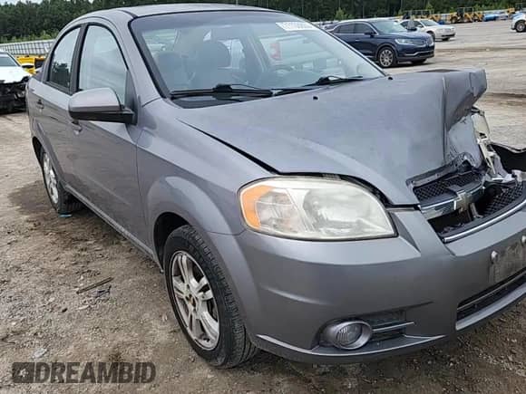 2011 Chevrolet Aveo 2LT с VIN KL1TG5DEXBB221597, выставлен на аукционе Copart как лот 71108655 с пробегом 103 582 миль миль и Списание • Salvage title. История ставок и продаж доступна на DreamBid. Изображение 14.