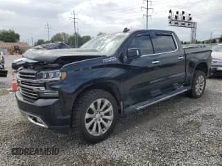 2019 Chevrolet Silverado 1500 High Country с VIN 3GCUYHEL0KG142052, выставлен на аукционе Copart как лот 84352495 с пробегом 85 826 миль миль и Списание • Salvage title. История ставок и продаж доступна на DreamBid. Изображение 1.