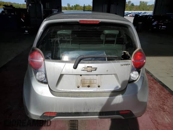 2013 Chevrolet Spark LS с VIN KL8CB6S93DC621607, выставлен на аукционе Copart как лот 81290145 с пробегом 52 139 миль миль и Списание • Salvage title. История ставок и продаж доступна на DreamBid. Изображение 6.