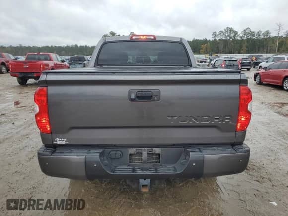 2016 Toyota Tundra Platinum with VIN 5TFGW5F11GX211137, listed as a Copart auction lot 82516064 with 105,524 mi miles and Salvage title. Bid and sale history available at DreamBid. Image 6.