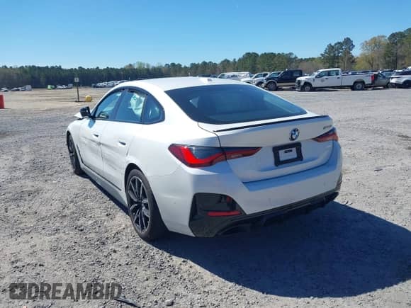 2024 BMW 4 Series M440i with VIN WBA63AW01RFS46965, listed as a IAAI auction lot 41879338 with 12,456 mi miles and . Bid and sale history available at DreamBid. Image 3.