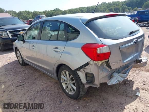 2013 Subaru Impreza Premium with VIN JF1GPAC63DH836379, listed as a IAAI auction lot 43228585 with 124,688 mi miles and . Bid and sale history available at DreamBid. Image 3.