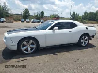 2013 Dodge Challenger R/T Classic с VIN 2C3CDYBT9DH680557, выставлен на аукционе Copart как лот 67026115 с пробегом 124 188 миль миль и Списание • Salvage title. История ставок и продаж доступна на DreamBid. Изображение 1.