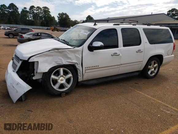2013 Chevrolet Suburban LTZ с VIN 1GNSKKE7XDR270897, выставлен на аукционе Copart как лот 82593994 с пробегом 89 975 миль миль и Списание • Salvage title. История ставок и продаж доступна на DreamBid. Изображение 1.