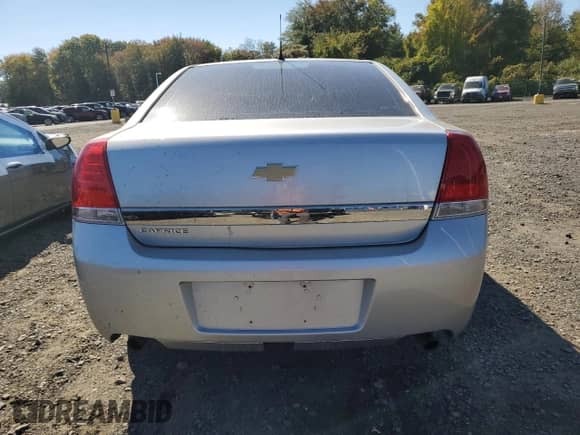 2013 Chevrolet Caprice Police Police with VIN 6G1MK5U27DL825490, listed as a Copart auction lot 84721455 with 105,492 mi miles and Salvage title. Bid and sale history available at DreamBid. Image 6.