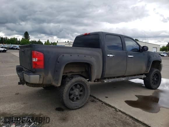 2012 Chevrolet Silverado 1500 LTZ with VIN 3GCPKTE72CG296137, listed as a Copart auction lot 56320765 with 180,551 mi miles and Salvage title. Bid and sale history available at DreamBid. Image 3.