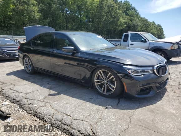 2016 BMW 7 Series 750i xDrive с VIN WBA7F2C58GG420362, выставлен на аукционе Copart как лот 69682485 с пробегом 79 928 миль миль и Списание • Salvage title. История ставок и продаж доступна на DreamBid. Изображение 4.