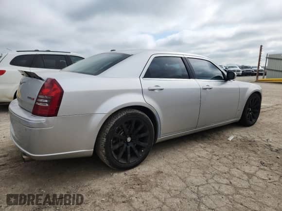 2007 Chrysler 300 C SRT-8 with VIN 2C3LA73W17H617839, listed as a Copart auction lot 60858475 with 180,655 mi miles and Salvage title. Bid and sale history available at DreamBid. Image 3.