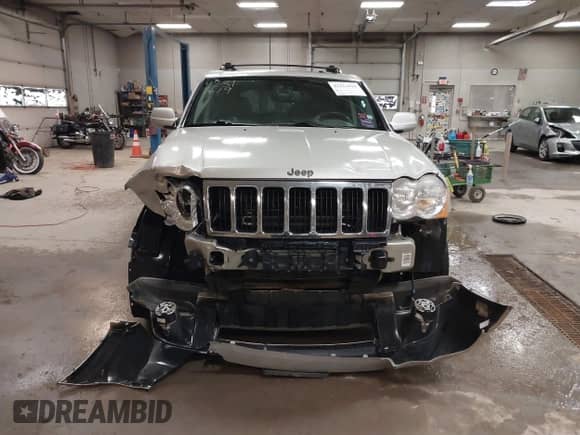 2010 Jeep Grand Cherokee Limited z VIN 1J4PR5GK7AC145720, wystawiony jako IAAI lot #42311619 z przebiegiem 221 641 mil mil oraz . Historia ofert i sprzedaży dostępna na DreamBid. Obrazek 12.