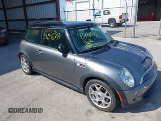 2003 MINI Hardtop S z VIN WMWRE33453TD73675, wystawiony jako IAAI lot #43194577 z przebiegiem 93 433 mil mil oraz . Historia ofert i sprzedaży dostępna na DreamBid. Obrazek 1.