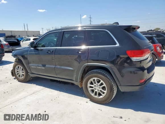 2018 Jeep Grand Cherokee Laredo z VIN 1C4RJEAG2JC480930, wystawiony jako Copart lot #65184965 z przebiegiem 70 700 mil mil oraz Szkoda całkowita • Salvage title. Historia ofert i sprzedaży dostępna na DreamBid. Obrazek 2.