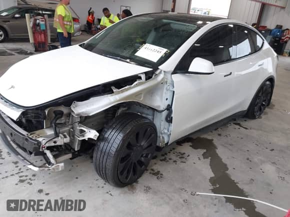 2021 Tesla Model Y Performance with VIN 5YJYGDEF7MF268781, listed as a IAAI auction lot 43312245 with 110,614 mi miles and . Bid and sale history available at DreamBid. Image 22.