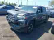 2016 Toyota Tacoma SR5 with VIN 3TMAZ5CNXGM009360, listed as a IAAI auction lot 43186084 with 89,490 mi miles and . Bid and sale history available at DreamBid. Image 2.