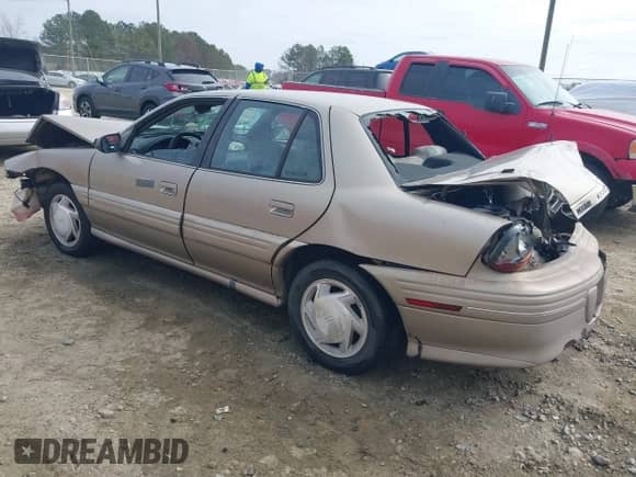 1997 Pontiac Grand Am SE с VIN 1G2NE52T1VC761092, выставлен на аукционе IAAI как лот 41547391 с пробегом 297 392 миль миль и . История ставок и продаж доступна на DreamBid. Изображение 3.