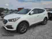 2018 Hyundai Santa Fe 2.4L с VIN 5NMZT3LB6JH092892, выставлен на аукционе Copart как лот 68391685 с пробегом 104 619 миль миль и Списание • Salvage title. История ставок и продаж доступна на DreamBid. Изображение 1.