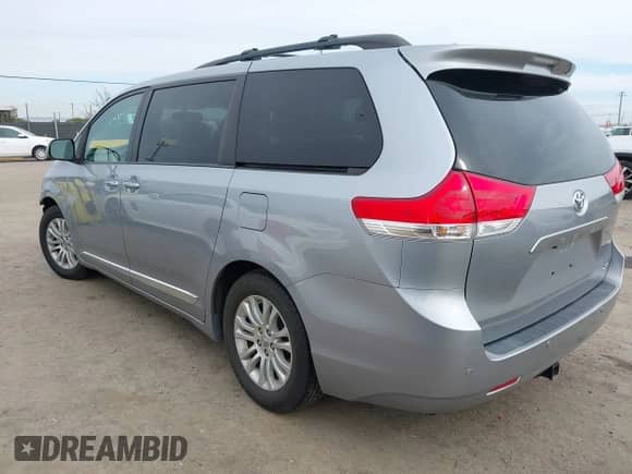 2013 Toyota Sienna XLE AAS with VIN 5TDYK3DCXDS312672, listed as a IAAI auction lot 41521263 with 183,707 mi miles and . Bid and sale history available at DreamBid. Image 3.