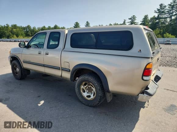2002 Toyota Tundra SR5 z VIN 5TBRN34102S254202, wystawiony jako Copart lot #71814075 z przebiegiem 167 582 mil mil oraz Szkoda całkowita • Salvage title. Historia ofert i sprzedaży dostępna na DreamBid. Obrazek 2.