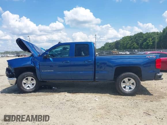 2015 Chevrolet Silverado 1500 LT z VIN 1GCVKREH7FZ251184, wystawiony jako IAAI lot #42564447 z przebiegiem Nie podano mil oraz . Historia ofert i sprzedaży dostępna na DreamBid. Obrazek 14.