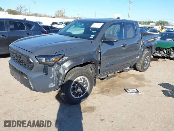 2024 Toyota Tacoma SR5 with VIN 3TYLB5JN0RT029530, listed as a IAAI auction lot 41213742 with 5,370 mi miles and . Bid and sale history available at DreamBid. Image 2.