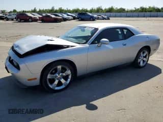 2012 Dodge Challenger SXT Plus with VIN 2C3CDYAG8CH294912, listed as a Copart auction lot 59397255 with 93,885 mi miles and Salvage title. Bid and sale history available at DreamBid. Image 1.