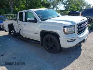 2018 GMC Sierra 1500 SLE z VIN 1GTV2MECXJZ145800, wystawiony jako IAAI lot #43058804 z przebiegiem 124 753 mil mil oraz . Historia ofert i sprzedaży dostępna na DreamBid. Obrazek 1.