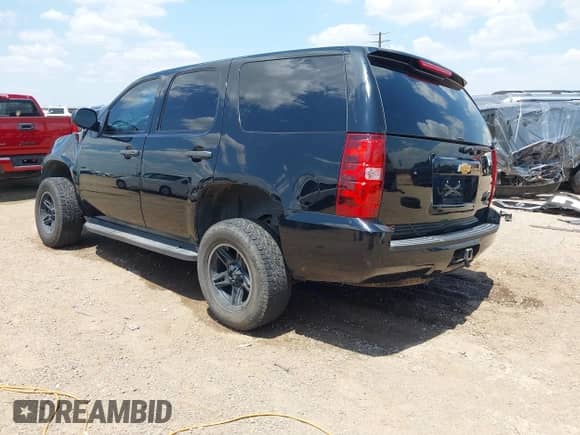 2012 Chevrolet Tahoe Commercial with VIN 1GNLC2E06CR157614, listed as a IAAI auction lot 42739163 with Not provided miles and . Bid and sale history available at DreamBid. Image 3.