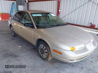 2001 Saturn SL с VIN 1G8ZJ52751Z323530, выставлен на аукционе IAAI как лот 43270139 с пробегом 111 982 миль миль и . История ставок и продаж доступна на DreamBid. Изображение 1.