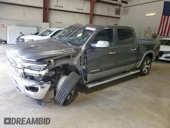 2019 Ram 1500 Laramie с VIN 1C6RREJT0KN582486, выставлен на аукционе Copart как лот 68841235 с пробегом 174 497 миль миль и Списание • Salvage title. История ставок и продаж доступна на DreamBid. Изображение 1.