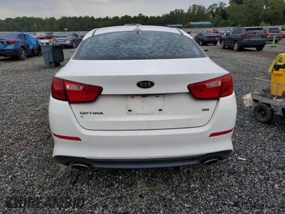 2015 Kia Optima LX с VIN KNAGM4A73F5586367, выставлен на аукционе Copart как лот 80941755 с пробегом 152 375 миль миль и Списание • Salvage title. История ставок и продаж доступна на DreamBid. Изображение 6.