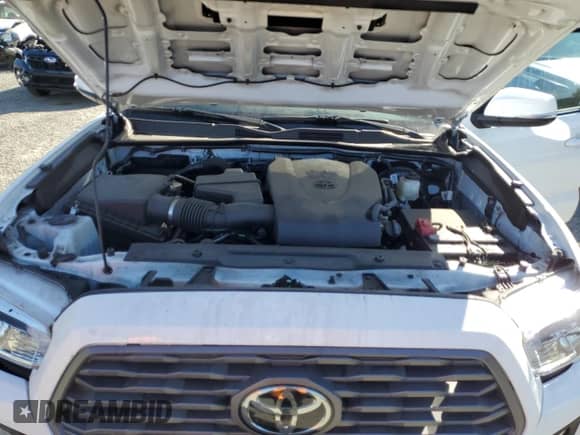 2022 Toyota Tacoma SR с VIN 3TMCZ5AN1NM504958, выставлен на аукционе Copart как лот 81156135 с пробегом 26 327 миль миль и Списание • Salvage title. История ставок и продаж доступна на DreamBid. Изображение 11.