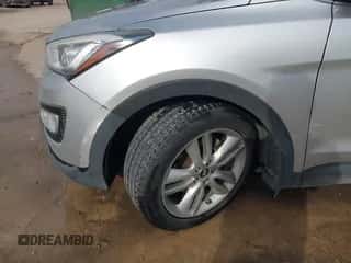 2014 Hyundai Santa Fe z VIN 5XYZW3LA1EG182451, wystawiony jako IAAI lot #43389479 z przebiegiem 103 801 mil mil oraz . Historia ofert i sprzedaży dostępna na DreamBid. Obrazek 6.