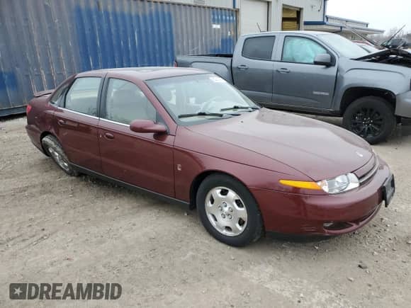 2000 Saturn LS с VIN 1G8JW52R4YY702549, выставлен на аукционе Copart как лот 85340484 с пробегом Не указан миль и На запчасти • Non repairable. История ставок и продаж доступна на DreamBid. Изображение 4.