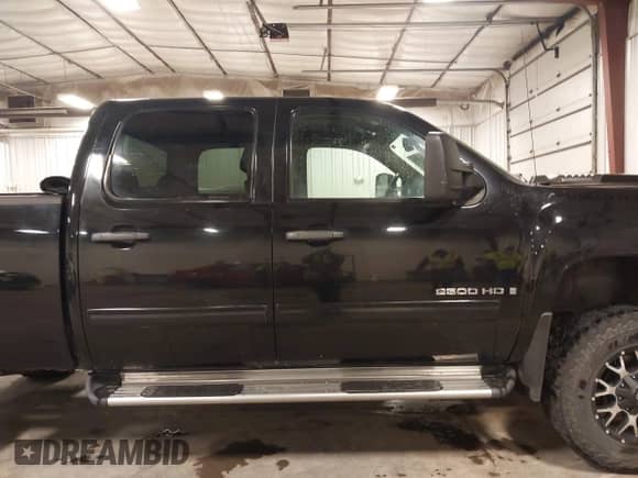 2009 Chevrolet Silverado 2500HD LT z VIN 1GCHK53609F187471, wystawiony jako IAAI lot #41972969 z przebiegiem 298 734 mil mil oraz . Historia ofert i sprzedaży dostępna na DreamBid. Obrazek 13.