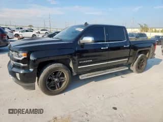 2017 Chevrolet Silverado 1500 LTZ z VIN 3GCUKSEJ2HG371970, wystawiony jako Copart lot #68804545 z przebiegiem 122 547 mil mil oraz Czysty tytuł • Clean title. Historia ofert i sprzedaży dostępna na DreamBid. Obrazek 1.