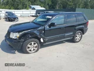 2008 Jeep Grand Cherokee Laredo with VIN 1J8HR48N78C164008, listed as a Copart auction lot 65600655 with 221,683 mi miles and Salvage title. Bid and sale history available at DreamBid. Image 1.