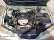 2005 Hyundai Elantra z VIN KMHDM46D05U165078, wystawiony jako Copart lot #73365894 z przebiegiem 142 314 mil mil oraz Szkoda całkowita • Salvage title. Historia ofert i sprzedaży dostępna na DreamBid. Obrazek 11.