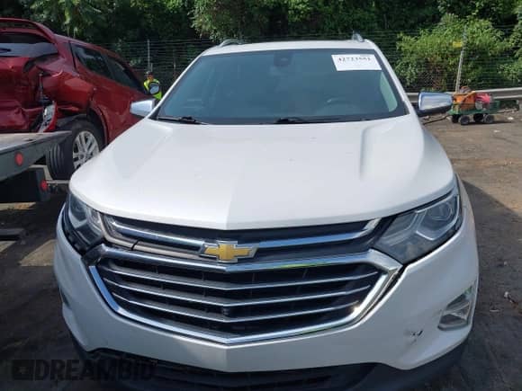 2020 Chevrolet Equinox Premier with VIN 3GNAXNEV2LS609550, listed as a IAAI auction lot 42723551 with 81,577 mi miles and . Bid and sale history available at DreamBid. Image 12.