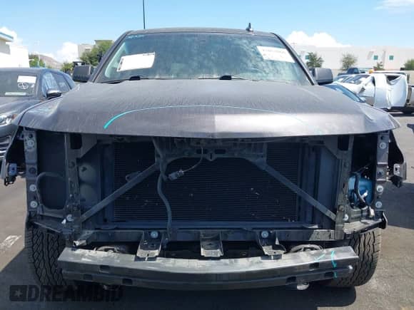 2015 Chevrolet Tahoe LS z VIN 1GNSCAKC0FR742276, wystawiony jako IAAI lot #43052060 z przebiegiem 58 077 mil mil oraz . Historia ofert i sprzedaży dostępna na DreamBid. Obrazek 13.