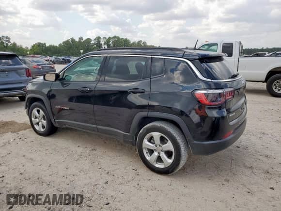 2021 Jeep Compass Latitude with VIN 3C4NJDBBXMT584022, listed as a Copart auction lot 69013615 with 74,898 mi miles and Salvage title. Bid and sale history available at DreamBid. Image 2.