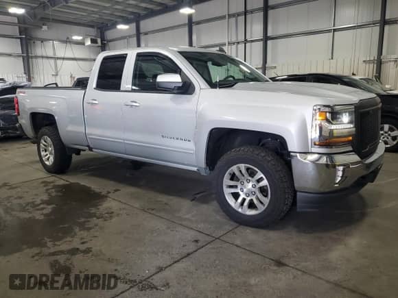 2016 Chevrolet Silverado 1500 LT with VIN 1GCVKREC3GZ405055, listed as a Copart auction lot 71188225 with 117,897 mi miles and Salvage title. Bid and sale history available at DreamBid. Image 4.