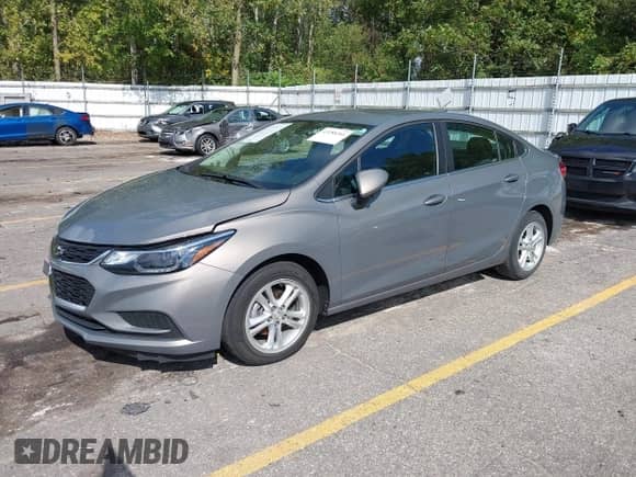 2018 Chevrolet Cruze LT with VIN 1G1BE5SM5J7153885, listed as a IAAI auction lot 43288366 with 40,829 mi miles and . Bid and sale history available at DreamBid. Image 2.