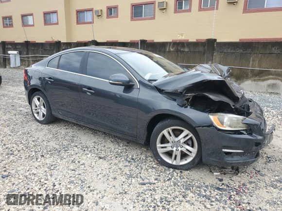 2015 Volvo S60 T5 Drive-E Premier with VIN YV140MFK4F1348785, listed as a Copart auction lot 80026105 with 74,217 mi miles and Salvage title. Bid and sale history available at DreamBid. Image 4.