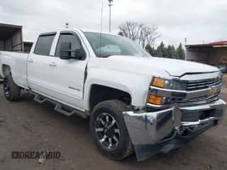 2015 Chevrolet Silverado 2500HD LT z VIN 1GC1KVEG6FF617734, wystawiony jako IAAI lot #41721265 z przebiegiem 165 445 mil mil oraz . Historia ofert i sprzedaży dostępna na DreamBid. Obrazek 1.