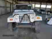 1997 Jeep Wrangler Sahara with VIN 1J4FY49S6VP523577, listed as a Copart auction lot 66736805 with 194,481 mi miles and Salvage title. Bid and sale history available at DreamBid. Image 5.