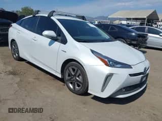 2022 Toyota Prius L Eco with VIN JTDKAMFU2N3177615, listed as a IAAI auction lot 42769578 with 128,795 mi miles and . Bid and sale history available at DreamBid. Image 1.