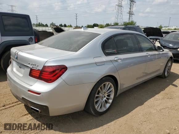 2015 BMW 7 Series 750Li z VIN WBAYE8C56FD782359, wystawiony jako Copart lot #67184815 z przebiegiem 77 457 mil mil oraz Szkoda całkowita • Salvage title. Historia ofert i sprzedaży dostępna na DreamBid. Obrazek 3.
