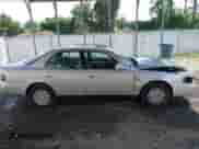 1996 Toyota Camry DX z VIN 4T1BG12K3TU825628, wystawiony jako IAAI lot #42745859 z przebiegiem 197 758 mil mil oraz . Historia ofert i sprzedaży dostępna na DreamBid. Obrazek 13.